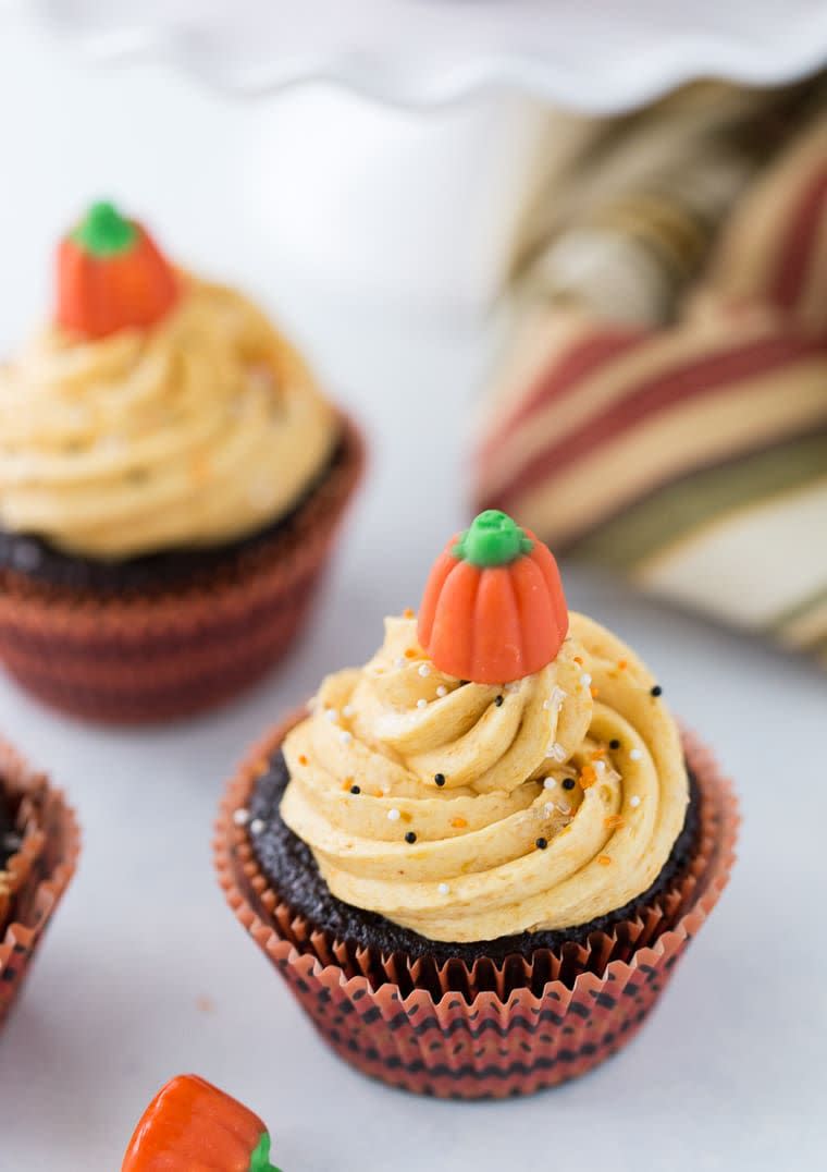 <p>A candy corn pumpkin makes these cupcakes complete!</p><p><em><a href="https://aclassictwist.com/chocolate-pumpkin-cupcakes/" rel="nofollow noopener" target="_blank" data-ylk="slk:Get the recipe from A Classic Twist »;elm:context_link;itc:0;sec:content-canvas" class="link ">Get the recipe from A Classic Twist »</a></em></p>