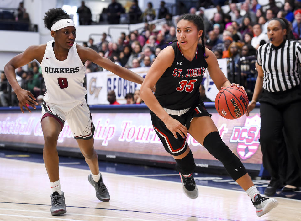 Azzi Fudd of St. John's dribbles in front of Jadyn Donovan of Sidwell Friends during the first half at George Washington University in Washington, D.C., on March 1, 2020.