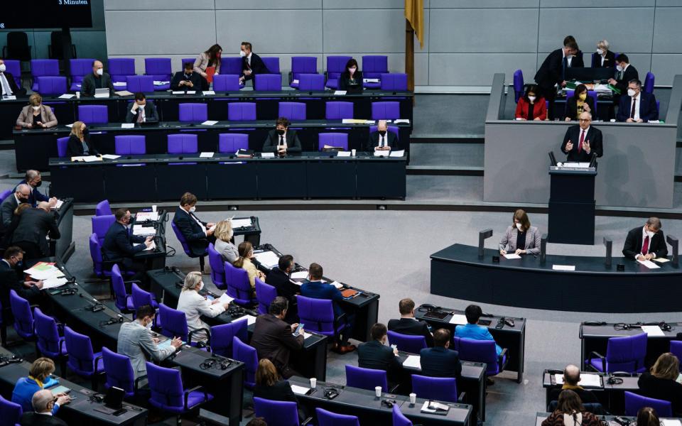 Mandatory Credit: Photo by CLEMENS BILAN/EPA-EFE/Shutterstock (12853464t) Mayor of Bremen Andreas Bovenschulte delivers a speech during a session of the German parliament in Berlin, Germany, 17 March 2022. German MPs are expected to discuss mandatory Covid-19 vaccination, among other topics. German parliament session in Berlin, Germany - 17 Mar 2022 - CLEMENS BILAN/EPA-EFE/Shutterstock 