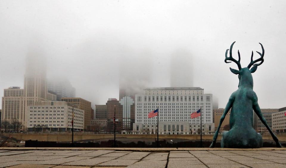 "Scioto Lounge" by Terry Allen has a foggy view of downtown January 3, 2014.