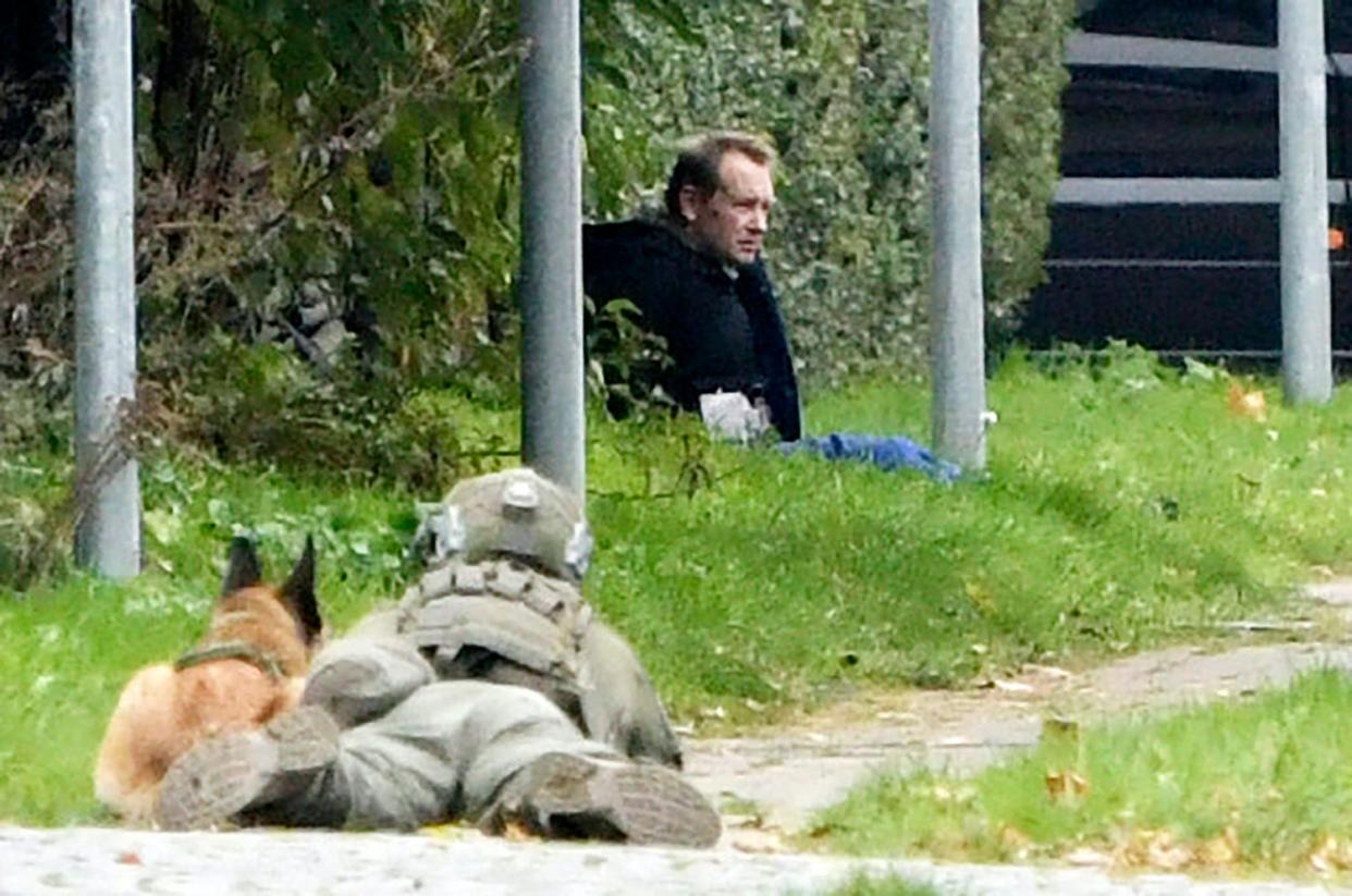 Peter Madsen seen sitting upright a few hundred metres outside prison (AP)