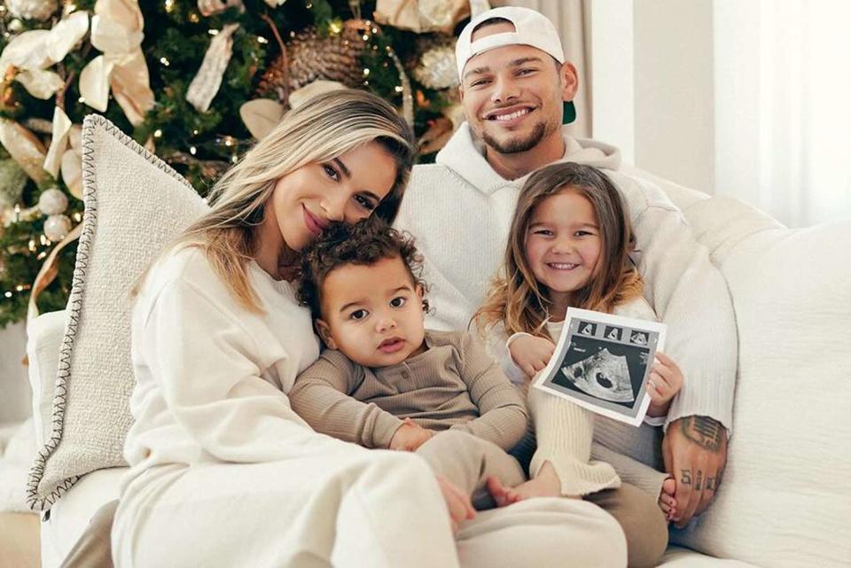 <p>Alex Alvga</p> Katelyn and Kane Brown with daughters Kodi and Kingsley
