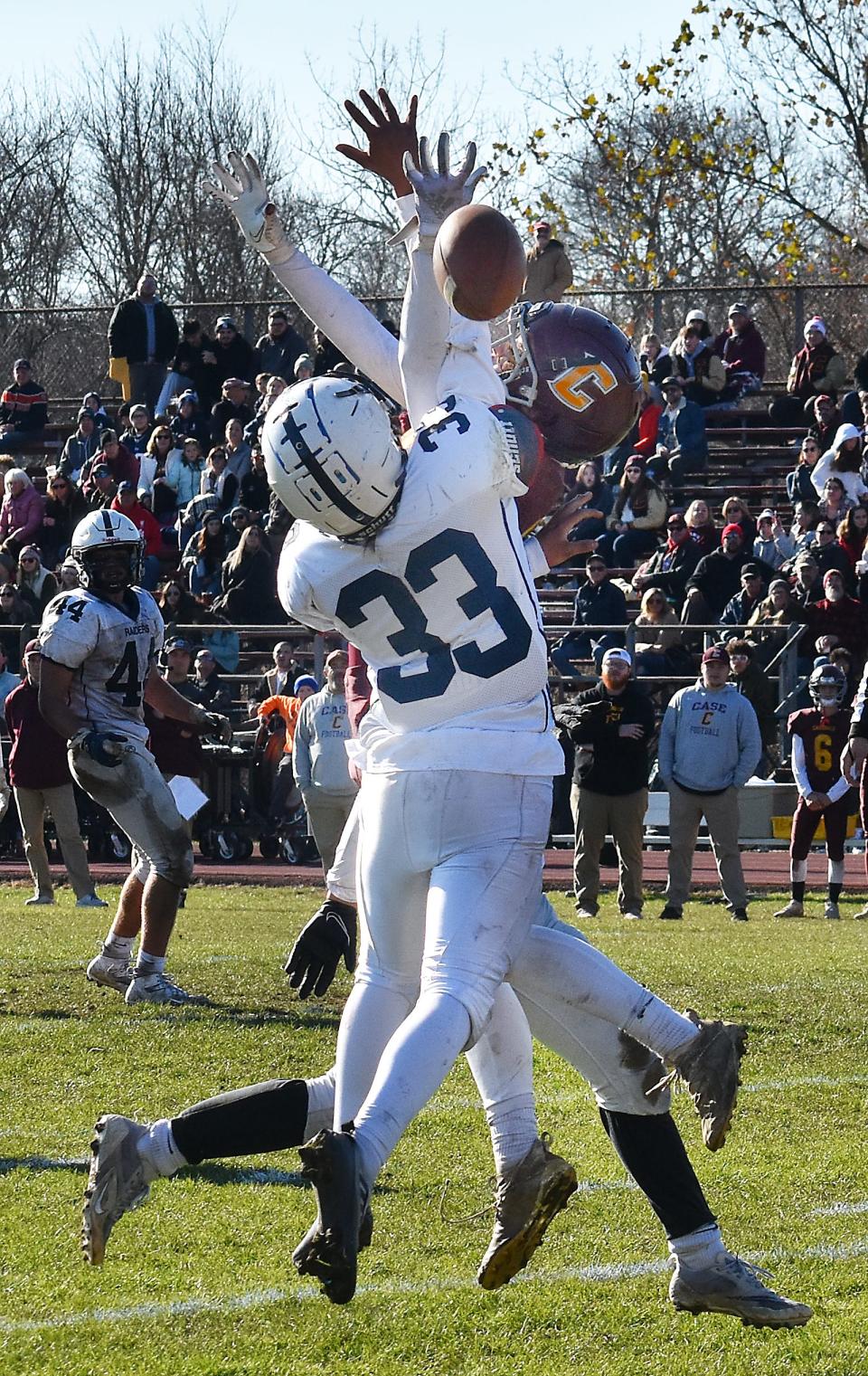 Case's Angelo Ciallella attempts to catch a pass on Somerset Berkley's Will Santos. The pass was incomplete.