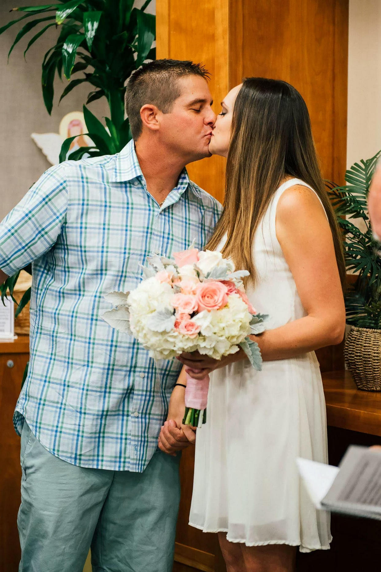 Sabrina and Justin Ernst wed in the chapel of a Florida hospital after their son developed a brain bleed. (Photo: Alicia Johnson Photography/SWNS)