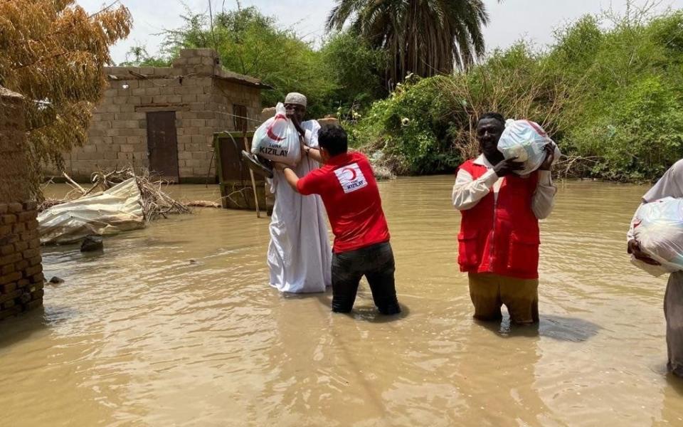 Most recently the Turkish Red Crescent distributed food parcels in the Al-Kalakla region in Khartoum, Sudan -  Anadolu Agency