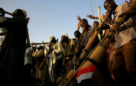 Sudanese demonstrators play traditional instruments during the sit-in protest outside Defence Ministry in Khartoum, Sudan April 20, 2019. REUTERS/Mohamed Nureldin Abdallah