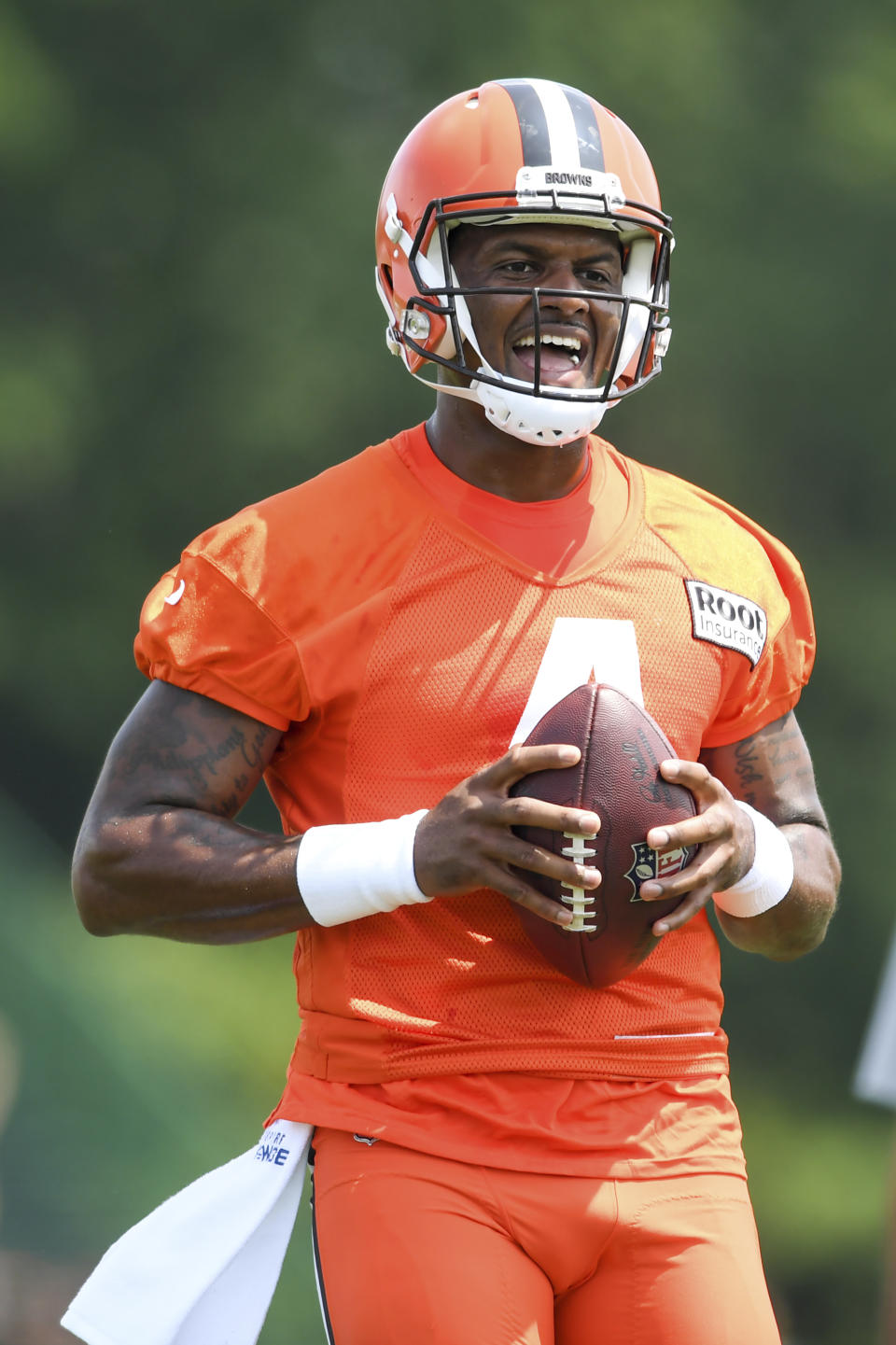 Cleveland Browns quarterback Deshaun Watson takes part in drills during the NFL football team's training camp, Monday, Aug. 1, 2022, in Berea, Ohio. (AP Photo/Nick Cammett)