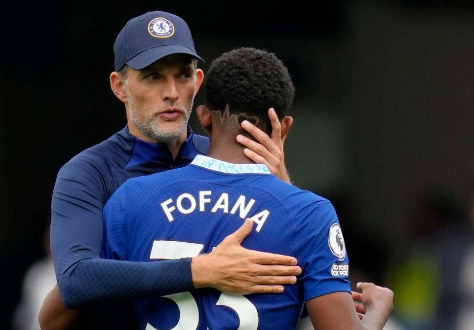 Chelsea’s head coach Thomas Tuchel hugs Wesley Fofana (AP)