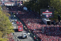 The MLB Washington Nationals celebrate the team's World Series baseball championship over the Houston Astros, with their fans in Washington, Saturday, Nov. 2, 2019. The Washington Nationals are getting a hero's welcome home from a city that had been thirsting for a World Series championship for nearly a century.(AP Photo/Cliff Owen)
