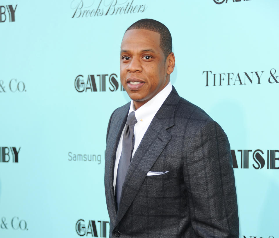 FILE - In this May 1, 2013 file photo, Jay-Z attends "The Great Gatsby" world premiere at Avery Fisher Hall in New York. The rapper released his 12th album, “Magna Carta Holy Grail,” three days early on Thursday, July 4, 2013, through a deal with Samsung. The album is officially out Sunday and features Justin Timberlake, Beyonce, Frank Ocean and Timbaland. (Photo by Evan Agostini/Invision/AP, File)