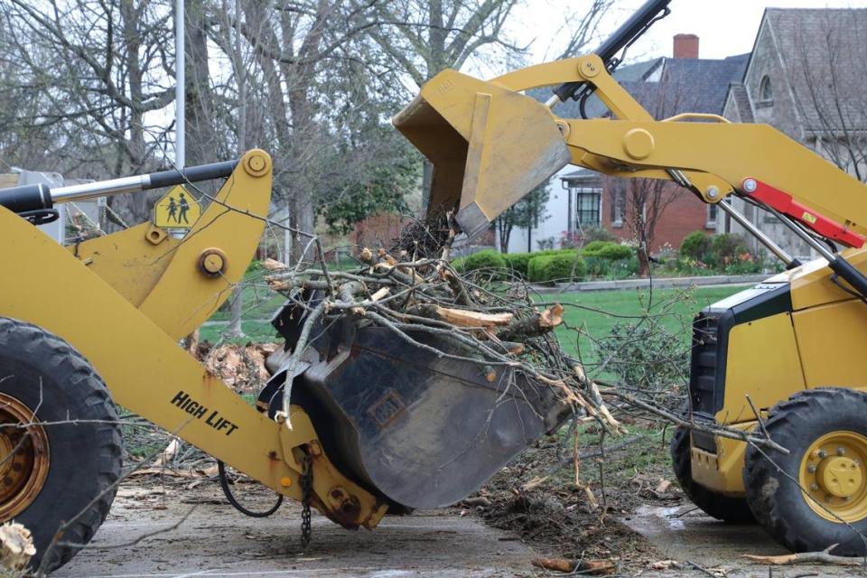 City clean-up crews work to remove storm debris from downed trees April 3, 2024 on Louisiana Ave. Tasha Poullard/tpoullard@herald-leader.com