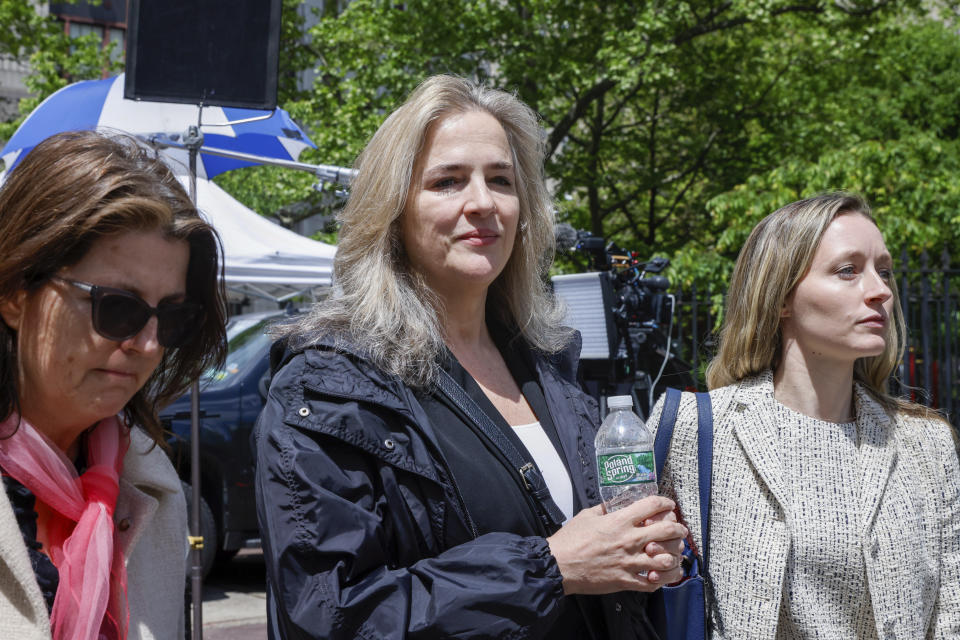 Natasha Stoynoff walks outside federal court in New York, Wednesday, May 3, 2023. Stoynoff, a former People magazine staff writer, will testify that former President Donald Trump pinned her against a wall and forcibly kissed her at his Florida mansion when she went there in 2005 to interview him and his then-pregnant wife Melania Trump. (AP Photo/Stefan Jeremiah)