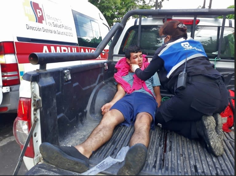An injured inmate is transfered by truck to a medical facility following the riot at the Bellavista prison in Santo Domingo de los Colorados (AFP/Juan Carlos Pérez)