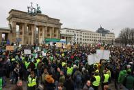 German farmers protest with tractors against the planned cut of vehicle tax subsidies in Berlin