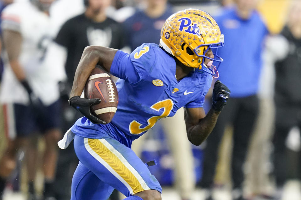 Pittsburgh's Jordan Addison (3) returns a punt during the first half of the team's NCAA college football game against Virginia, Saturday, Nov. 20, 2021, in Pittsburgh. (AP Photo/Keith Srakocic)