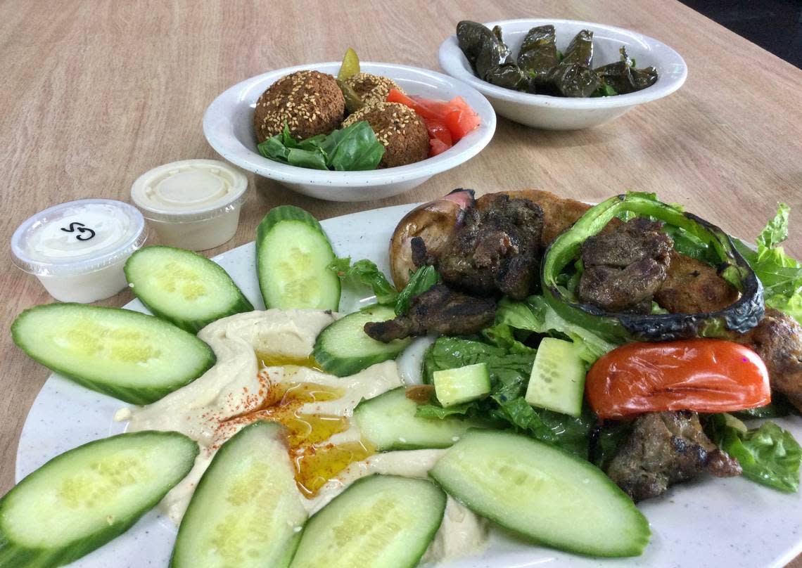 Here’s a sampling of some of the food offered at at Wrap & Kebab in Centerville, including falafels, grape leaves, kufta chicken and steak (lamb) kebab, humus and salad.