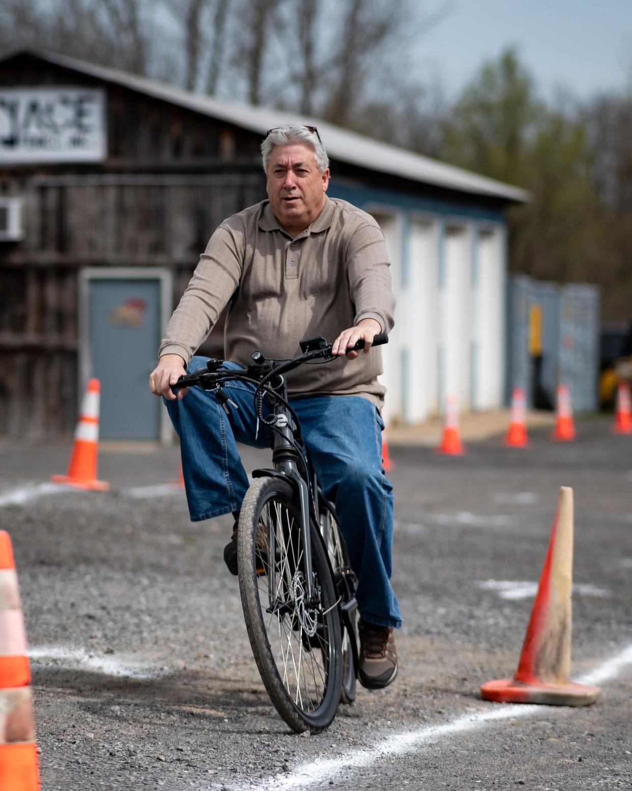 Christopher Lorence test drives an electric bicycle at the new eBliss Experience Center in Clinton, NY on Saturday, April 27, 2024.