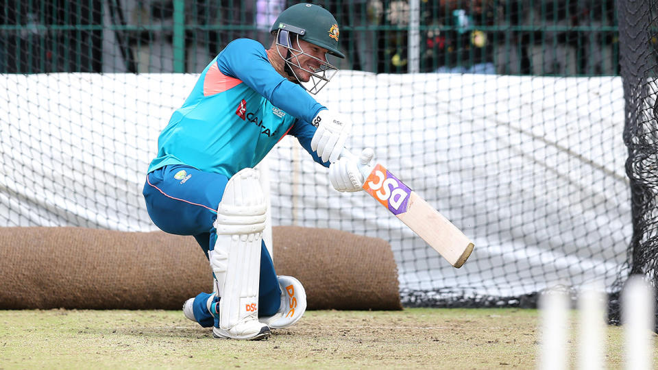 David Warner bats in the nets during an Australia training session.