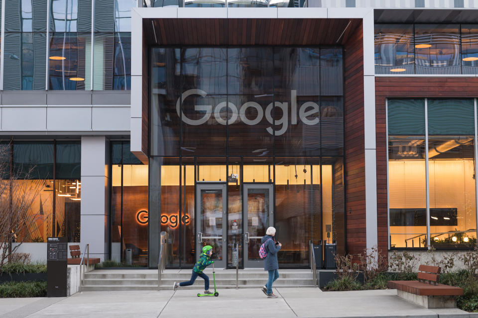 Seattle, USA - Jan 22, 2022: The new Google campus in the south lake union late in the day as a people pass.