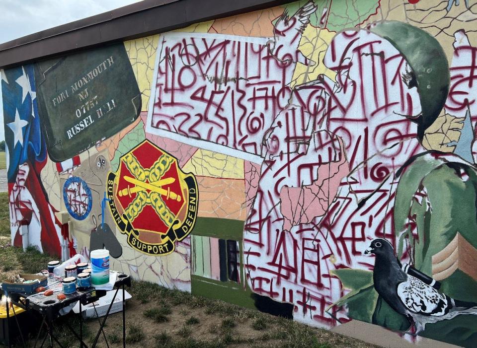 A look at the new mural as it was in process at Fort Monmouth's former headquarters building Russel Hall. The mural, painted by Brendan Ryan, pays tribute to the fort's history of technological development. Russel Hall is now home to TetherView, a cloud-based tech company.