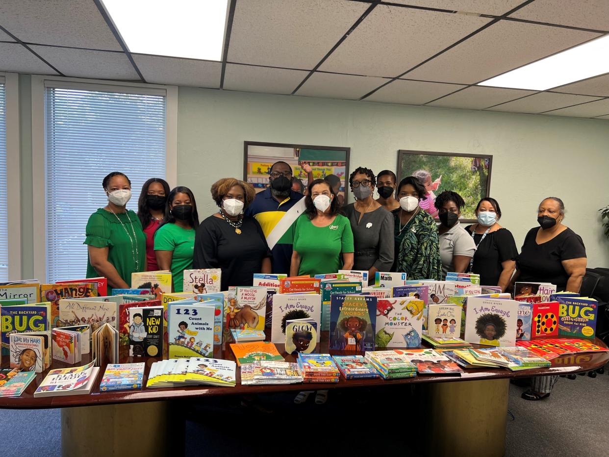 Members of The Tallahassee Chapter of The Links, Inc. and the Capital Area Community Action Agency’s Head Start Staff pictured with donated books.