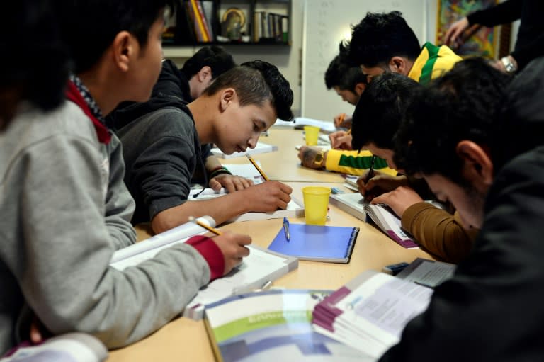 A Greek language course for refugee boys and adolescents in Athens financed in part by the US aid group Mercy Corps on March 10, 2017.Noticing that many activities were offered to migrant children but little to teenagers and young adults, the NGO Mercy Corps with funds from major international companies finances projects for some young refugees in partnership with locals