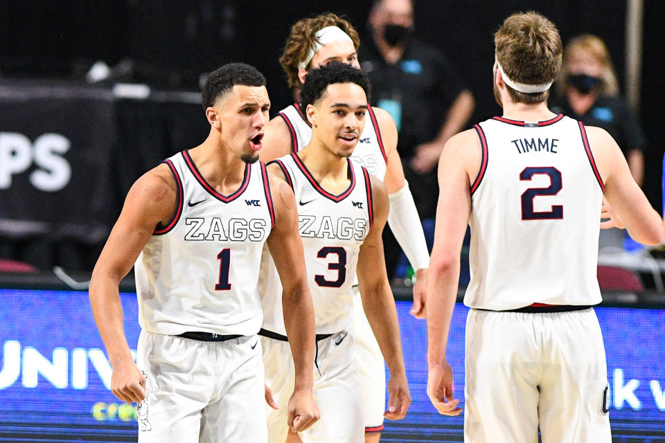 Gonzaga guard Jalen Suggs (1), Gonzaga guard Andrew Nembhard (3) celebrate during the championship game of the men's West Coast Conference basketball tournament between the BYU Cougars and the Gonzaga Bulldogs on March 9, 2021, at the Orleans Arena in Las Vegas, NV. (Photo by Brian Rothmuller/Icon Sportswire via Getty Images)