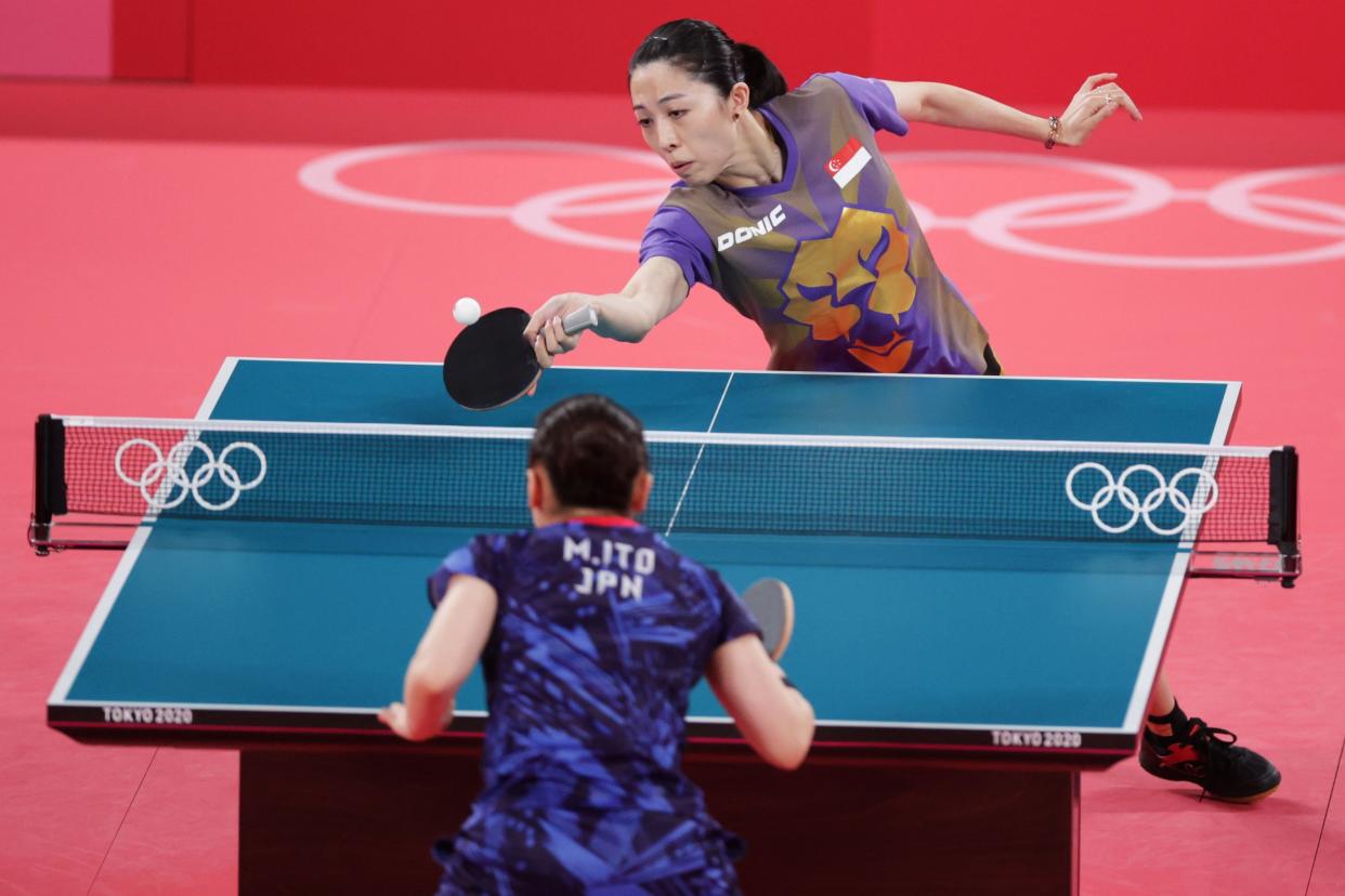 Singapore paddler Yu Mengyu returns a shot against Mima Ito of Japan in the women's singlers bronze-medal match at the 2020 Tokyo Olympics.