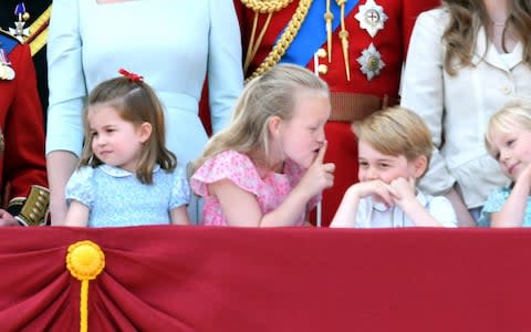 Princess Charlotte stands next to Savannah Phillips and Prince George at Trooping The Colour 2018 - Credit: Karwai Tang/WireImage