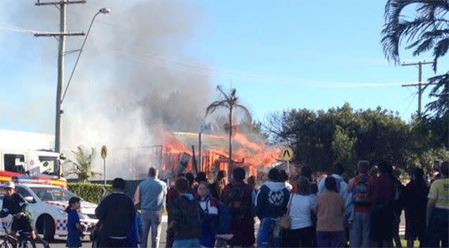 Neighbours watch on in horror as a Beenleigh home goes up in flames. Source: Supplied