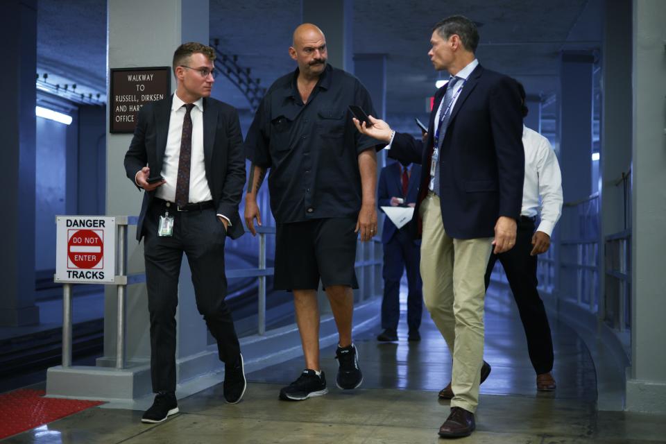 U.S. Sen. John Fetterman, D-Pa., walks to the Senate chambers in the U.S. Capitol Building on Sept. 20, 2023 in Washington, DC. after Senate Majority Leader Chuck Schumer dropped dress code rules for the Senate. On Sept. 28, 2023, senators responded by passing a resolution mandating a coat, tie and slacks for men on the Senate floor.