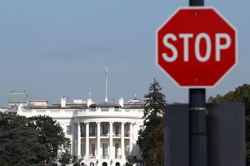 FILE PHOTO: A 'Stop' sign is seen in front of the White House in Washington