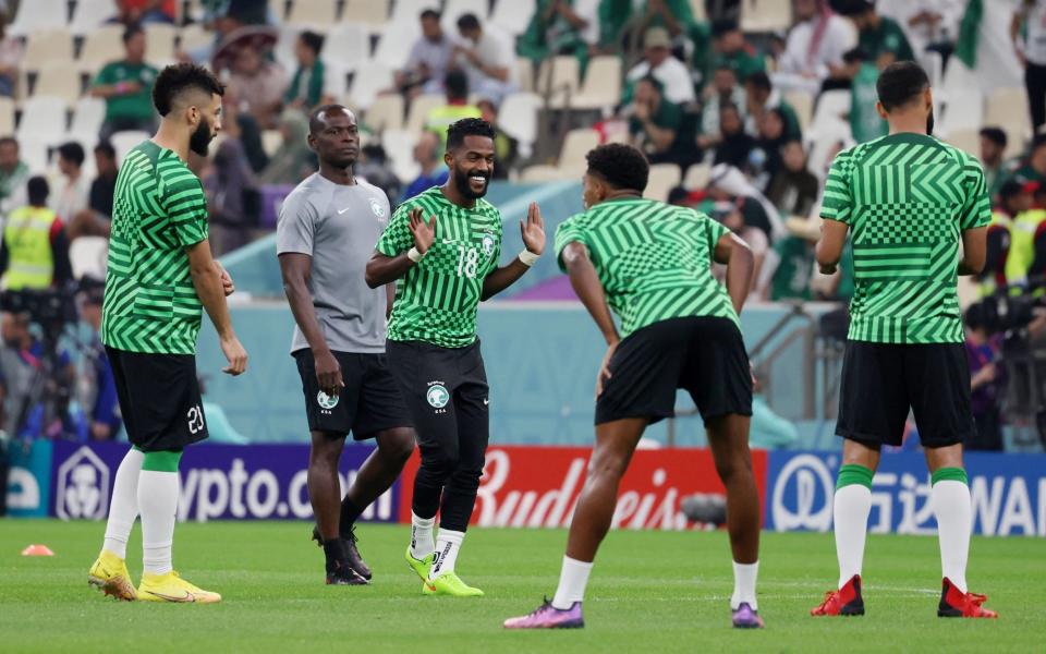  Saudi Arabia's Nawaf Al Abid during the warm up before the match - Amr Abdallah Dalsh/Reuters