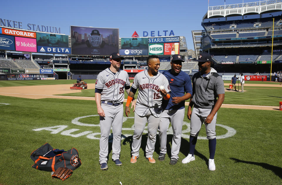 Houston Astros players, from left, relief pitcher Ryan Pressly, catcher Martin Maldonado, relief pitcher Hector Neris, and starting pitcher Cristian Javier celebrate after a combined no-hitter against the New York Yankees. Saturday, June 25, 2022, in New York. The Houston Astros won 3-0. (AP Photo/Noah K. Murray)