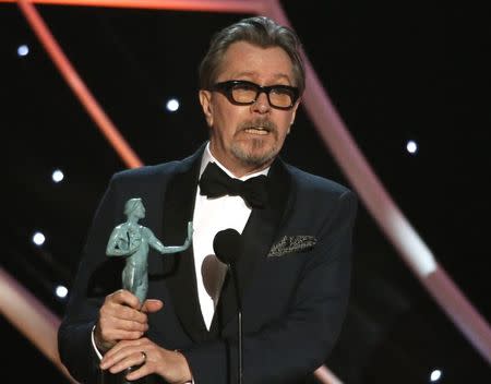 24th Screen Actors Guild Awards – Show – Los Angeles, California, U.S., 21/01/2018 – Gary Oldman accepts the award for Outstanding Performance by a Male Actor in a Leading Role for "Darkest Hour." REUTERS/Mario Anzuoni