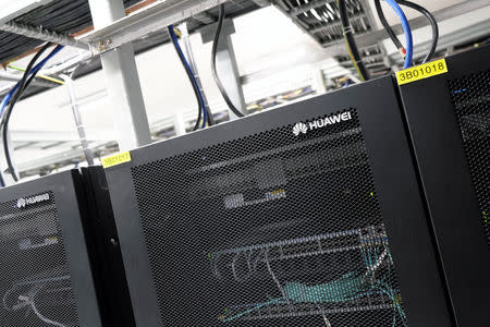 Servers sit inside Huawei's factory campus in Dongguan, Guangdong province, China March 25, 2019. REUTERS/Tyrone Siu