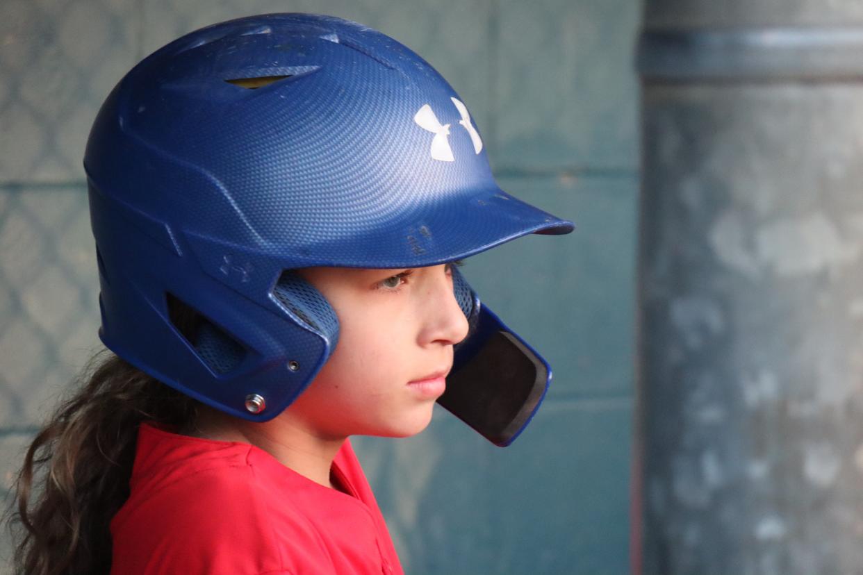 Layla Goode, 12, waits her turn to bat during a Brick Little League Majors Division baseball game on April 22, 2024.