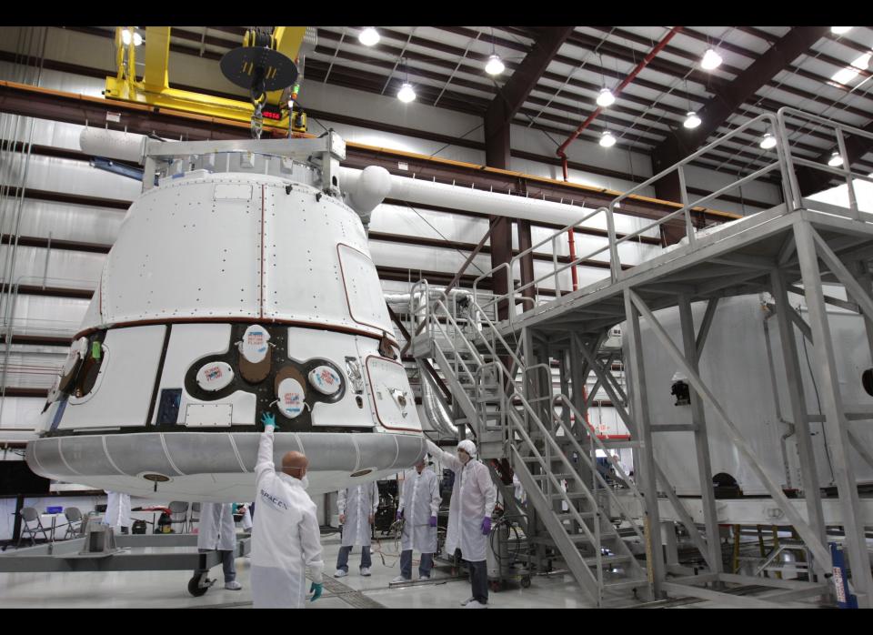 The <a href="http://www.spacex.com/SpaceX_Brochure_V7_All.pdf" target="_hplink">Dragon capsule</a> is only about 20 feet long, has a max diameter of 12.1 feet and weighs 9,260 lbs. It can carry 13,228 lbs up to space and 6,612 lbs down from space. The capsule was designed so that, eventually, it will be able to bring <a href="http://www.spacex.com/dragon.php" target="_hplink">as many as seven passengers</a> up to orbit.