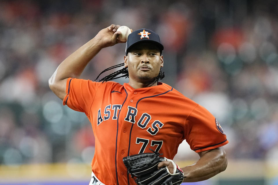 Houston Astros starting pitcher Luis Garcia throws against the Miami Marlins during the first inning of a baseball game Friday, June 10, 2022, in Houston. (AP Photo/David J. Phillip)