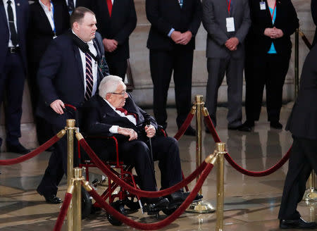 Former Secretary of State Henry Kissinger is shown to his place in the U.S. Capitol Rotunda ahead of the body of late U.S. Senator John McCain lying in state in Washington, U.S., August 31, 2018. REUTERS/Eric Thayer
