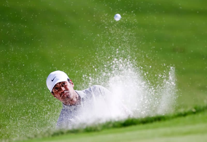 FILE PHOTO: Tony Finau plays a shot from a bunker on the seventh hole during the second round of the Charles Schwab Challenge at Colonial Country Club, Texas.