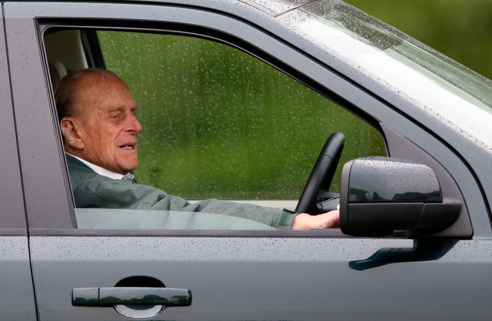 WINDSOR, UNITED KINGDOM - MAY 14: (EMBARGOED FOR PUBLICATION IN UK NEWSPAPERS UNTIL 48 HOURS AFTER CREATE DATE AND TIME) Prince Philip, Duke of Edinburgh watches the Dressage phase of the Carriage Driving competition whilst sitting in his Land Rover on day 2 of the Royal Windsor Horse Show in Home Park on May 14, 2015 in Windsor, England. (Photo by Max Mumby/Indigo/Getty Images)