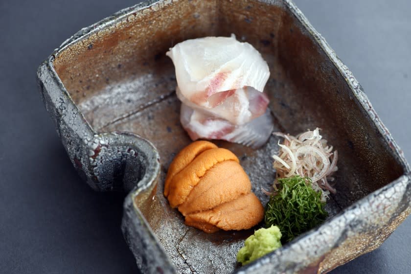 Mariah Tauger  Los Angeles Times Wild Japanese sea bream and Hokkaido uni sashimi, left, and ichiban dashi, Dungeness crab in a cloudless broth, right.