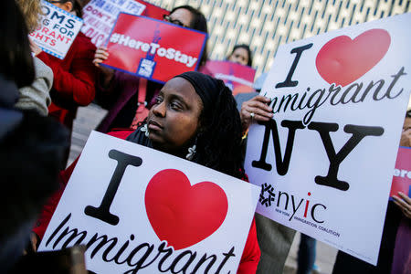 Haitian immigrants and supporters rally to reject DHS Decision to terminate TPS for Haitians, at the Manhattan borough in New York, U.S., November 21, 2017. REUTERS/Eduardo Munoz