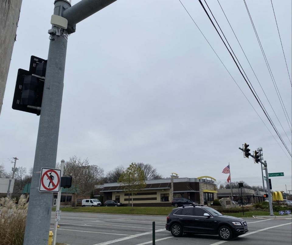 The city of Upper Arlington is purchasing 14 radar vehicle-detection units, like the gray rectangular device affixed near the mast arm at the intersection of Fishinger Road and Riverside Drive.