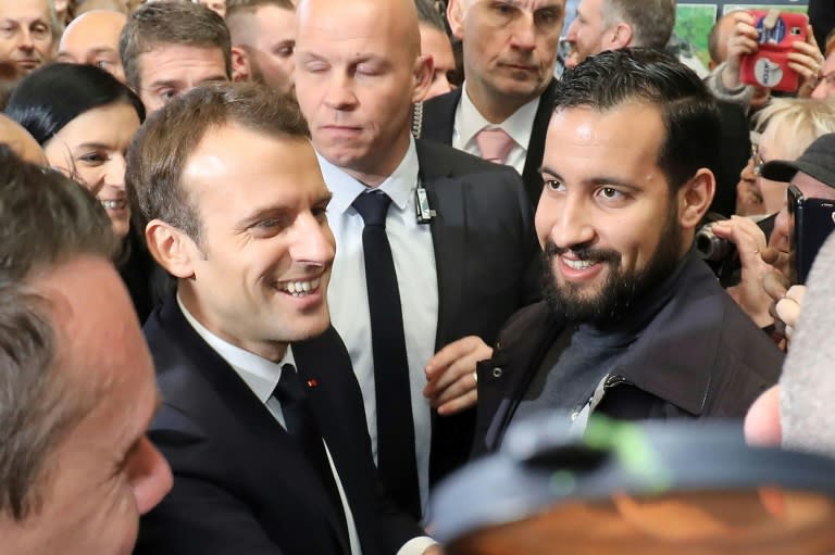 French President Emmanuel Macron pictured in February with his bodyguard Alexandre Benalla, who was caught on video roughing up protesters while wearing a police helmet