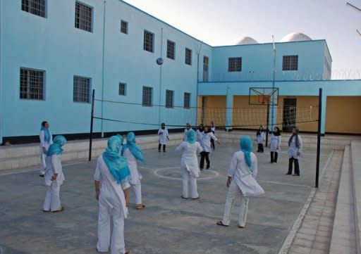 File photo for illustrative purposes showing female Afghan prisoners playing volleyball in a prison. A woman who has served two years in jail after a relative raped her at her home is to be released after 5,000 people signed a petition in support of her case