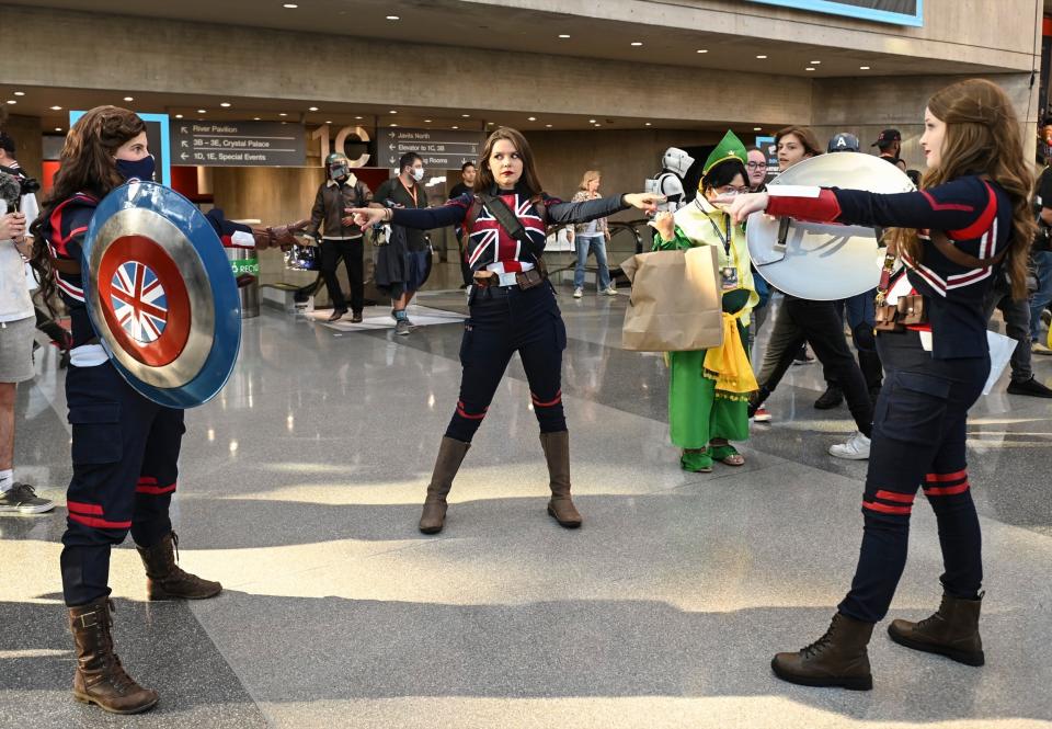 Cosplayers dressed as Peggy Carter/Captain Carter at New York Comic Con 2022.