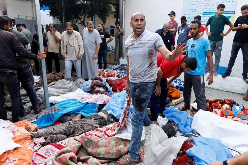 Bodies of Palestinians killed in Israeli strikes laid out at a hospital in the southern Gaza Strip.