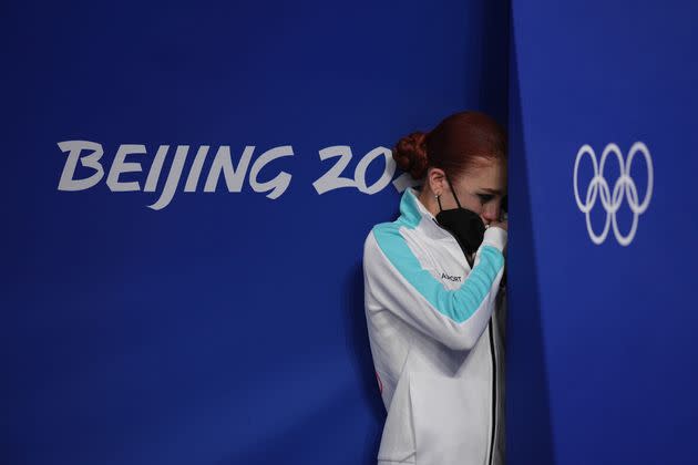 Silver medalist Alexandra Trusova reacts during the flower ceremony after the women's figure skating event. (Photo: China News Service via Getty Images)